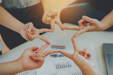 Group Of Students Or Businessman Hands Together Joining For Teamwork