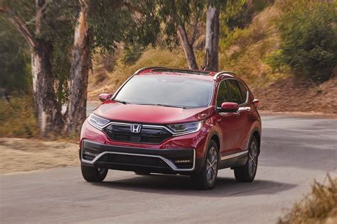 Touring shown in sonic gray pearl with honda genuine accessories. 2020 Honda CR-V Touring Hybrid Review by Mark Fulmer +VIDEO