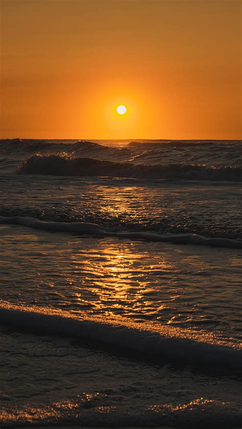 Ocean Waves Crashing On Shore During Sunset Hd Phone Wallpaper Peakpx