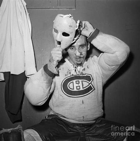 Jacques Plante Putting On Mask Poster By Bettmann