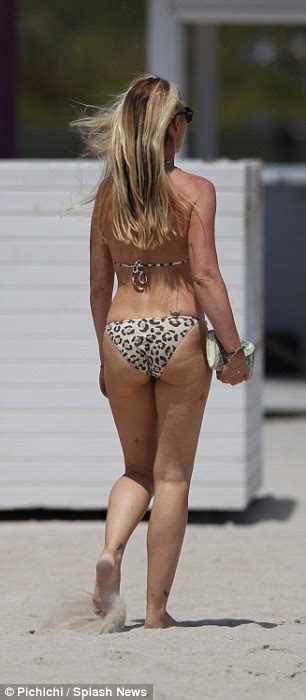 Tamara Beckwith Hits The Beach In Skimpy Leopard Print Bikini Daily