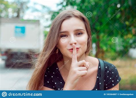 Woman Asking For Silence Or Secrecy With Finger On Lips Hush Hand