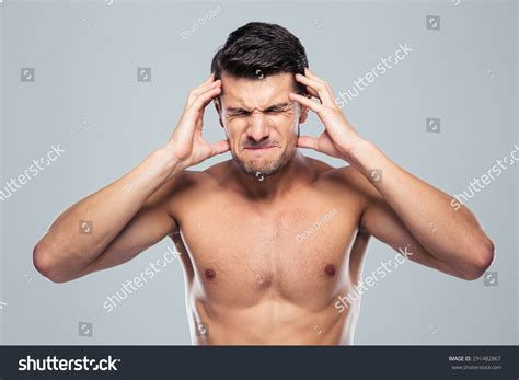 Man Screaming And With An Intense Headache Shutterstock