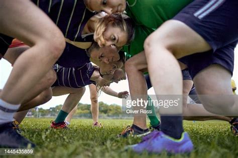 Womens Rugby Teams In A Scrum On Sports Field High Res Stock Photo