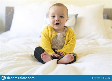 Nice And Cute Baby Sit In White Bedding Stock Image Image Of Skin