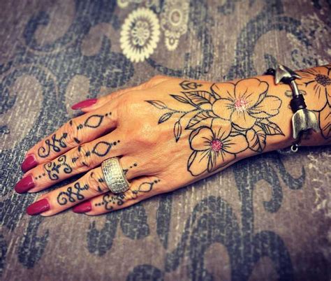 Flower Hand Tattoos For Girls