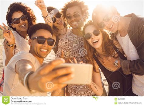 Group Of Multiracial Happy Friends Taking Selfie And Having Fun Stock