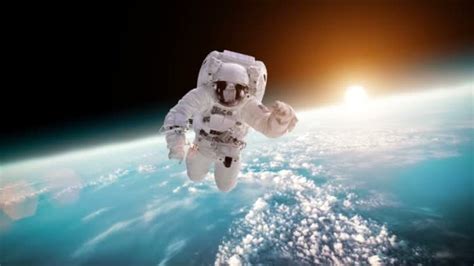 Astronaut In Outer Space Against The Backdrop Of The