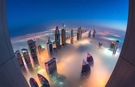 Heavenly Photographs Of Dubai Skyscrapers Poking Through A Sea Of Clouds
