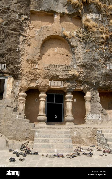 Pillars At Entrance Of Buddhist Caves On Mountain At Lenyadri