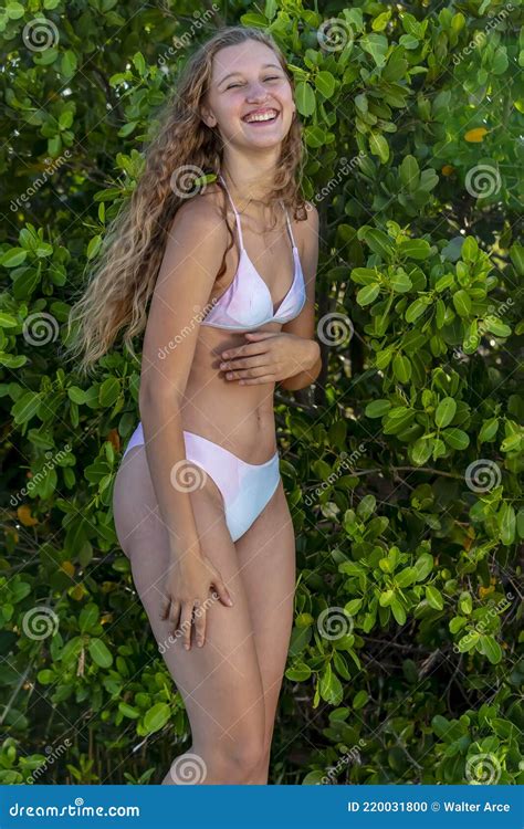 Lovely Blonde Bikini Model Posing Outdoors On A Caribbean Beach Stock Photo Image Of Modern