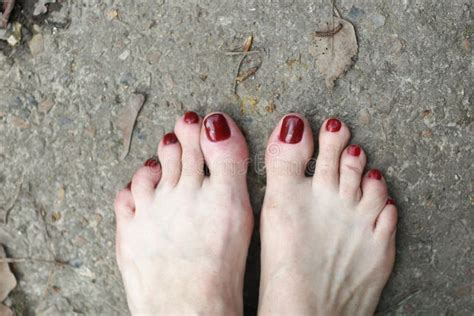 Women Bare Legs And Feet With Red Pedicure Close Up Photo Stock Image Image Of Painless