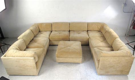 Eighteen inches of space around all sides of your sectionalcan be a good rule of thumb. Large Selig Sectional Sofa with Ottoman, Mid-Century ...