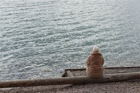Lonely Woman Sitting By The Lake Alone Stock Photo Image Of Death
