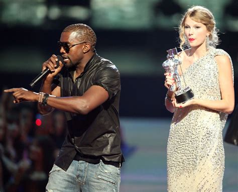 Kanye West Taylor Swift Just Cant Get Over 2009 Vma Mic Snatching Beef