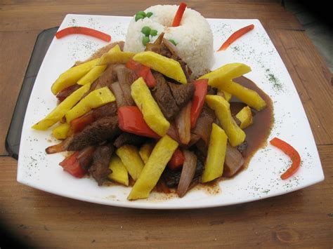 Season the sliced meat with salt and pepper to taste. Lomo saltado | Peruvian recipes, Food, Food and drink