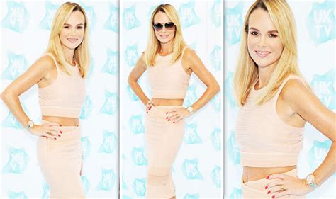 Amanda Holden Sizzles As She Flaunts Ridiculously Toned Abs In Figure