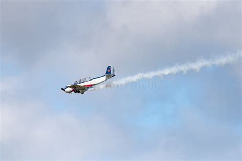 Yak 52 Aircraft In The Sky Performs The Program At The Air Show