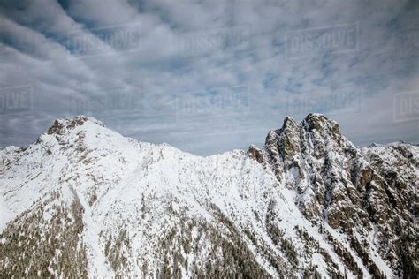 Aerial View Of Beautiful Snow Capped Mountains During Winter Stock