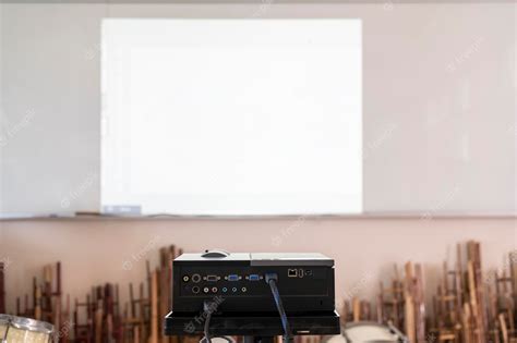 Premium Photo Projector In Action With Illuminated Teacher Teaching