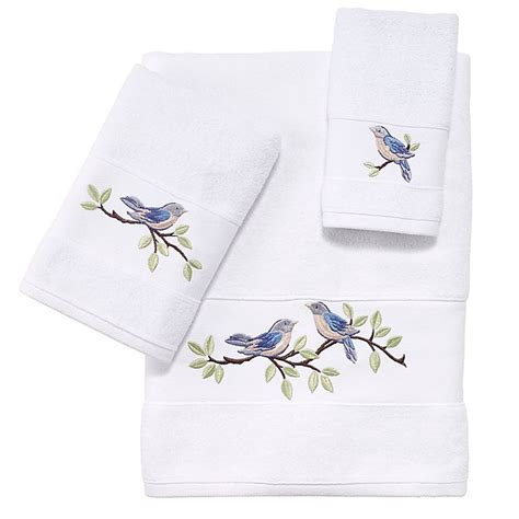 Avanti Blue Birds Bath Towel Collection In White Bed