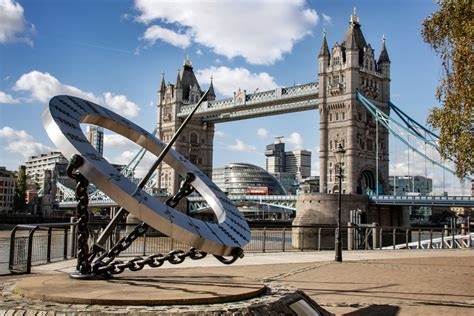 Download Sculpture Near Tower Bridge London Wallpaper