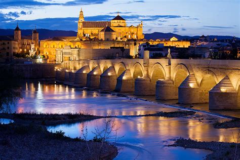 Cathedral Mosque And Roman Bridge In Cordoba Photograph By Artur