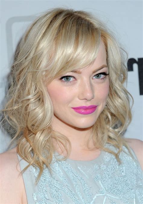 Actress emma stone arrives at the 2017 vanity fair oscar party hosted by graydon carter at wallis annenberg center for the performing arts on. Emma Stone Medium Blonde Curly Hairstyle for Spring ...