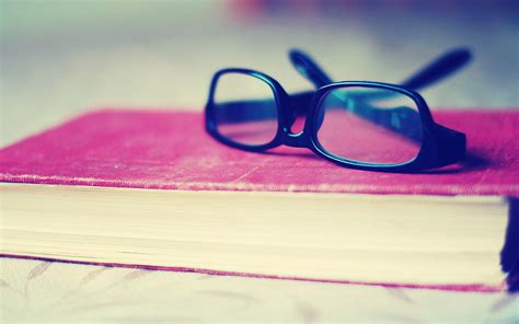 Glasses On Book Wallpaper