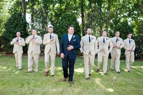 Navy Blue Groom With Tan Groomsmen And Matching Ties Tan Groomsmen