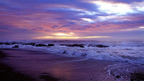 Coast Beach Rocks Sea Waves Sunset Wallpaper
