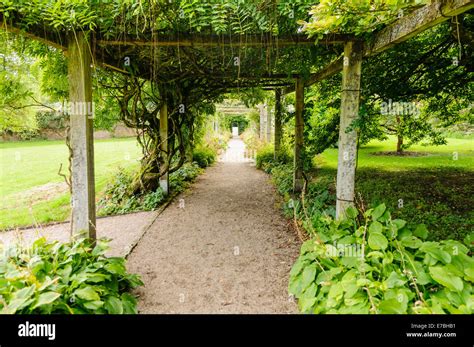 Long Pergola In A Formal Garden Stock Photo Alamy