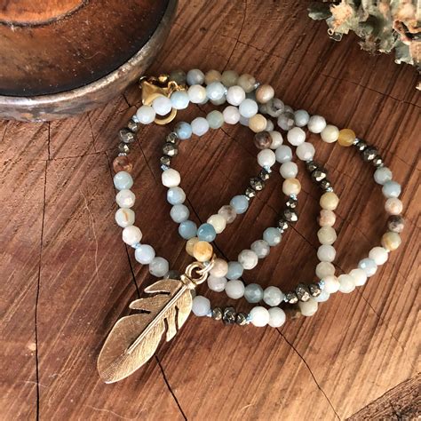Amazonite and Pyrite Feather Necklace | Feather charm necklace, Feather necklaces, Feather charms