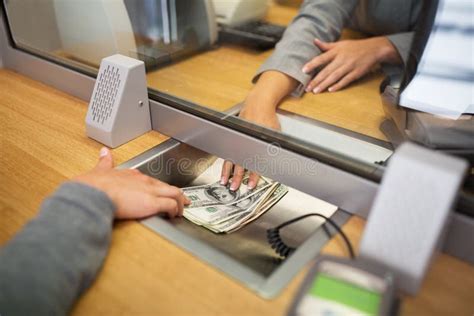 Clerk Giving Cash Money To Customer At Bank Office Stock Image Image