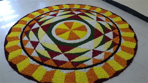 So we thought of sharing some of the best pookalam designs 2017 which can be used for athapookalam competitions. Pookalam design - Flower Carpet - Onam
