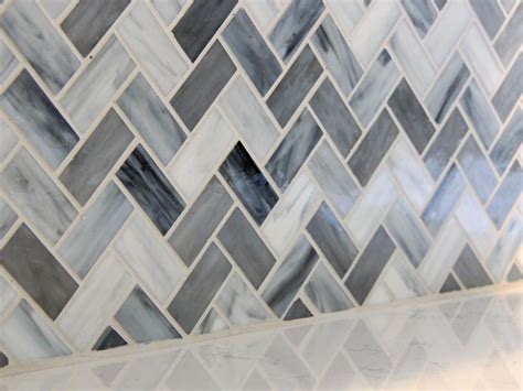 Marble is a timeless yet expensive material that can be used for decor of every space, from sleek white cabinets and a white marble backsplash that makes the whole space very exquisite and edgy. Blue-Gray Chevron Glass Mosaic Backsplash | Glass mosaic ...