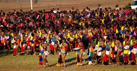 Women In Traditional Costumes Dancing At The Umhlanga Aka Reed Dance For Their King Lobamba