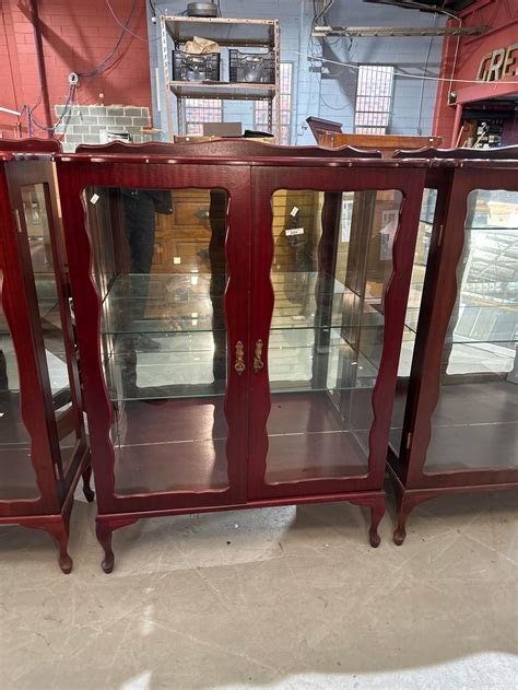 At Auction Vintage Cedar Two Door Display Cabinet Mirror Backed With