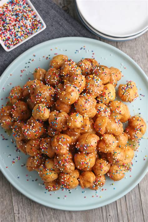Struffoli are deep fried authentic italian honey balls traditionally from southern italy with a zesty twist. Italian Struffoli Honey Balls | Wishes and Dishes