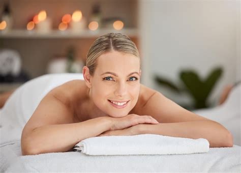 premium photo portrait relax and massage with a woman lying in spa for wellness treatment at a