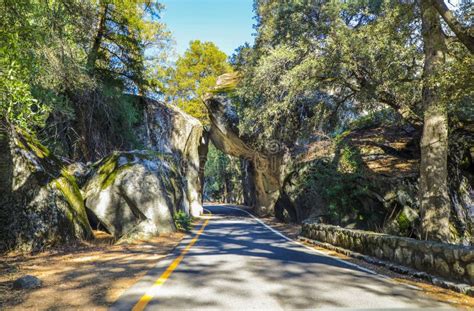 Natural Rock Tunnel Along Road In Yosemite National Park Stock Image
