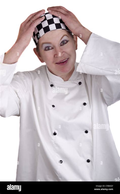 Female Chef Holding Both Hands Over Her Black And White Checkered Chef