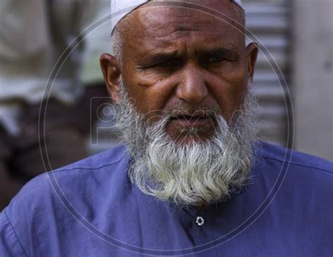 Image Of Muslim Man Clothes Vendor In A Stall Ye415363 Picxy