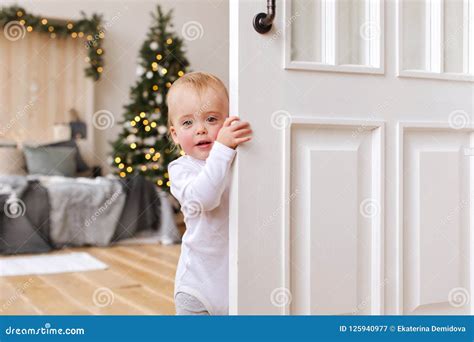 Children Peeking Out Of The Open Room Door Stock Image Image Of House