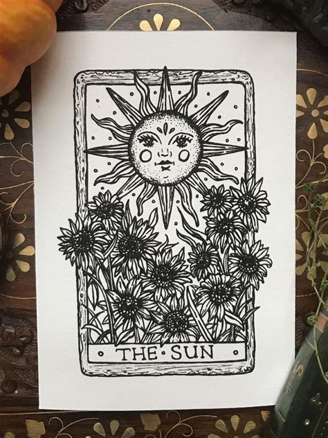 The Sun Tarot Card Surrounded By Flowers