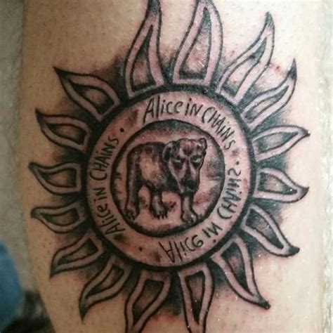 The design has the burger chains name, and a picture of a burger. 3.1-Alice in chains tatoo | Chain tattoo, Chain tattoo design, Tattoos