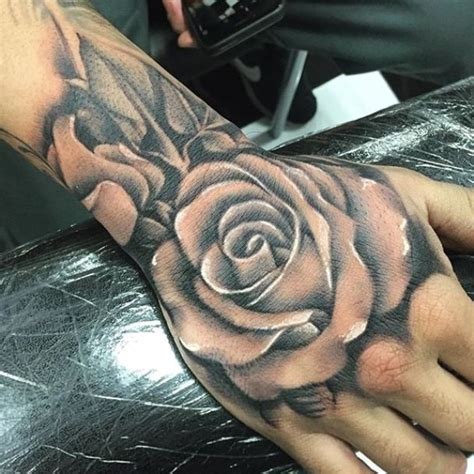 47 Rose Hand Tattoos For Women Hand Tattoos For Guys Rose Hand