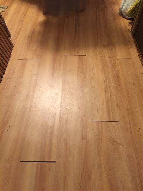 Use a utility knife to cut the feature strips to the correct length (image 3). The vinyl plank click flooring I installed in two rooms ...