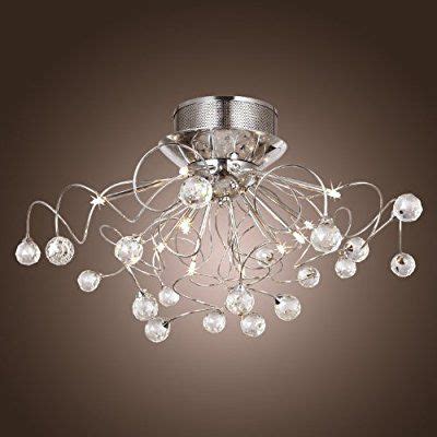 Lampadari moderni a soffitto lampadari moderni a soffitto collezione di lampade da parete o da plafone con struttura metallica verniciata bianca e piastra frontale in acciaio lucido. ALFRED® Lampadario di cristallo moderna con 11 luci ...