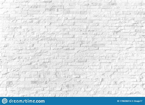 Background And Texture White Brick Stone Cladding Wall Stock Photo